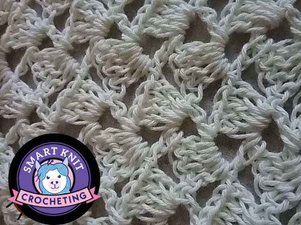 A swatch of the Crochet Drunken Stitch worked in white A swatch of the Crochet Drunken Stitch worked in white