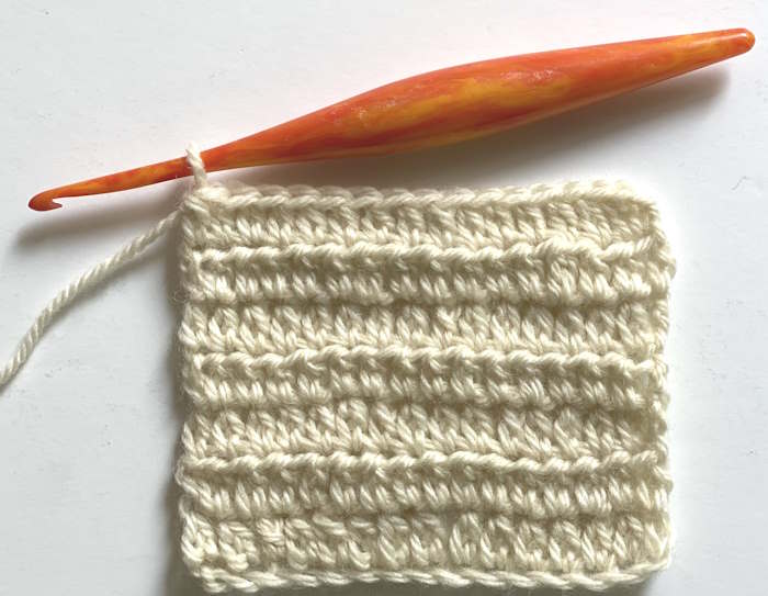 Taller stitches using extended half double crochet for loose, drapey fabric.