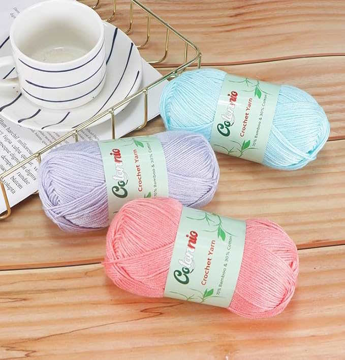 Three skeins of fingering weight yarn