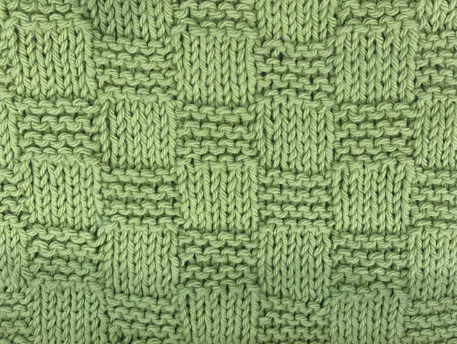 A swatch of garter checkerboard stitch showing the right side