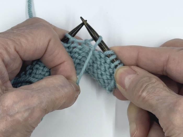 Step 3 and 4 for making the german short row technique on knit side of fabric