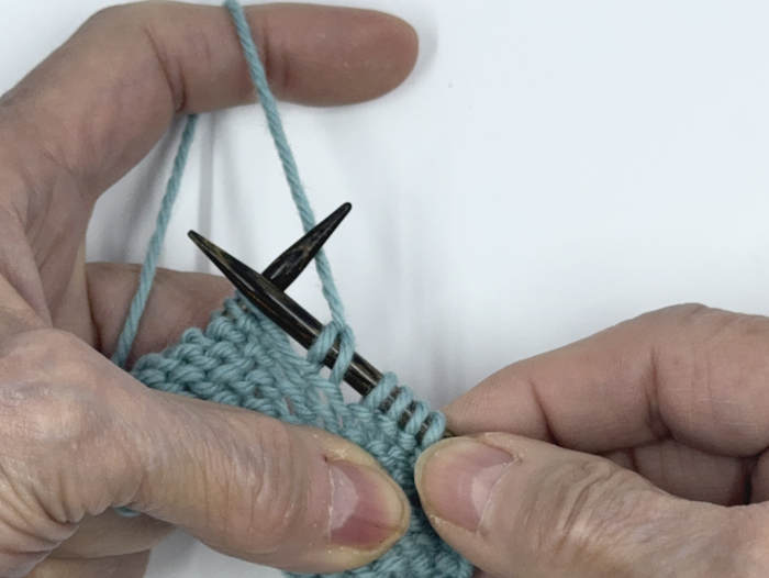 Step 4 for doing the german short row technique on the knit side of the work