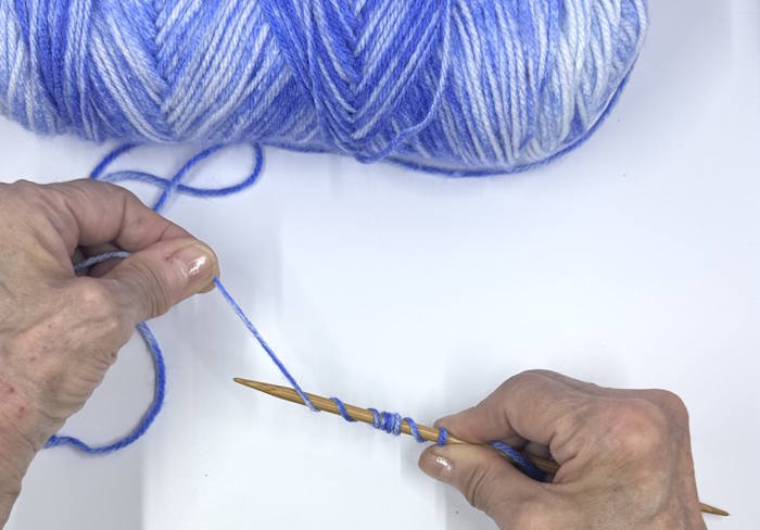 Showing one method of measuring yarn for a german twisted cast on method Showing one method of measuring yarn for a german twisted cast on method