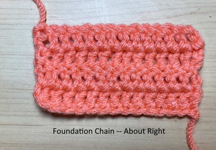Foundation chain row that is about right shown with rows of double crochet stitches.