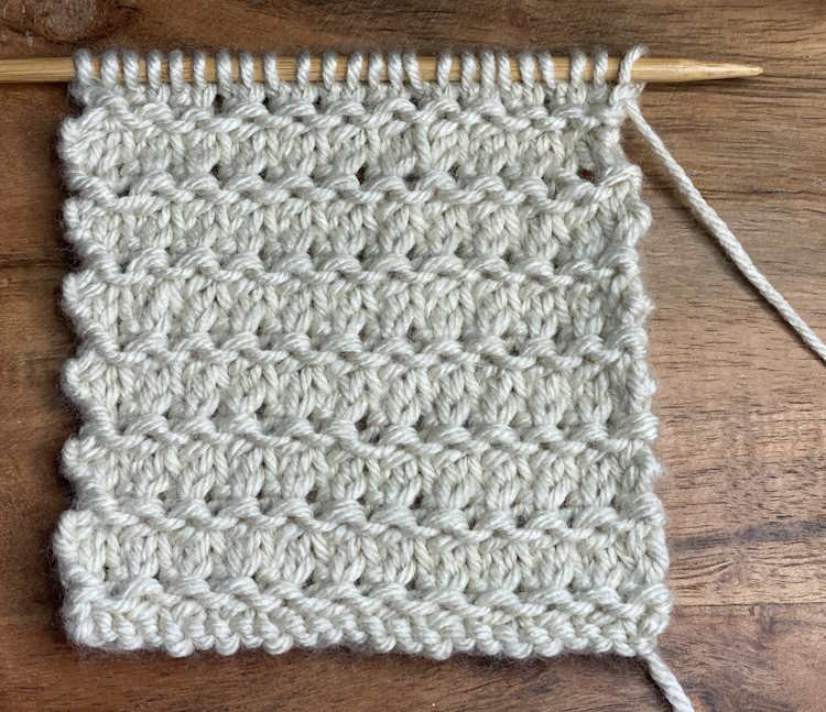 Right side showing of the granite lace knitting stitche pattern.