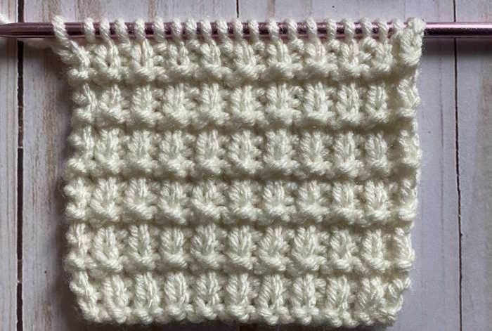 Right side showing of the grid knit stitch pattern