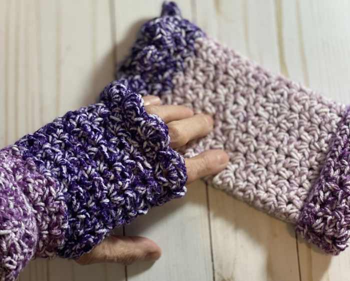 A pair of fingerless gloves created using the half-double crochet v stitch