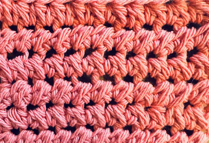 A closeup of the half double crochet cluster stitch A closeup of the half double crochet cluster stitch