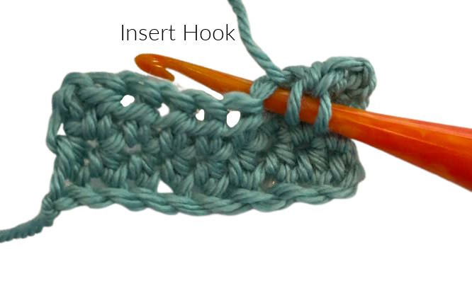 Step 2 of Half Double Crochet Stitch:  Insert hook