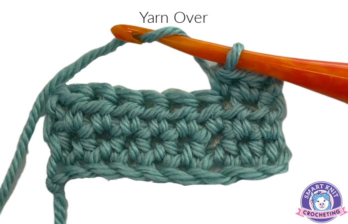 Step one when making a half double crochet:  Yarn Over