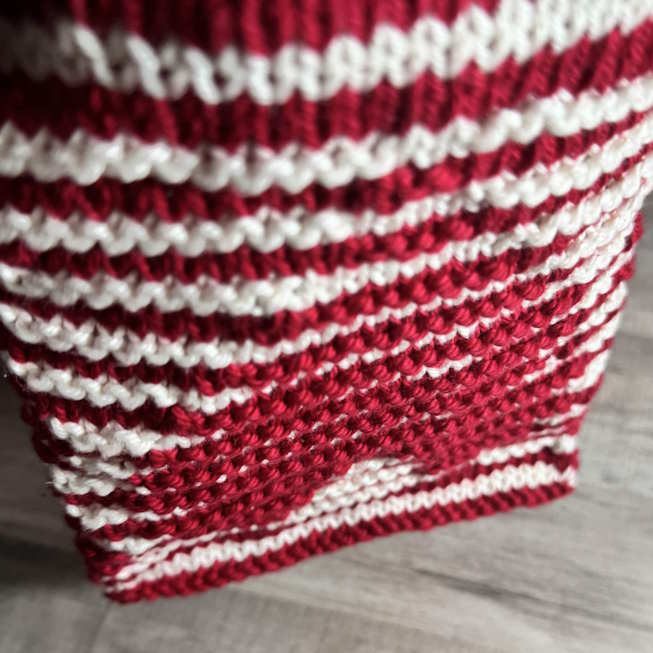 A heart is showing in the sample of illusian knitting