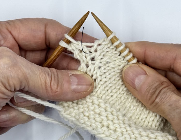 Step one on how to make the left leaning lifted knit increase