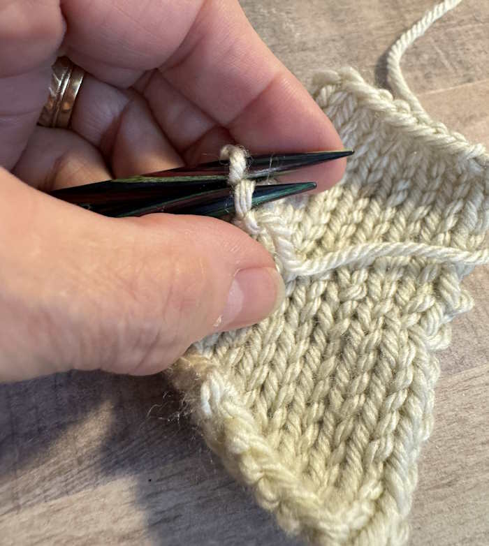 Kitchener stitch with the last two stitches remaining on the needles.