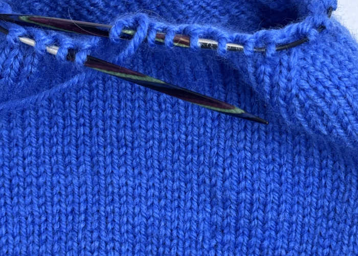 A blue hat still on the needles (Knit Picks Ergonomic Needles)