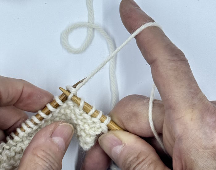 Step 3 of making the knit stitch English Style