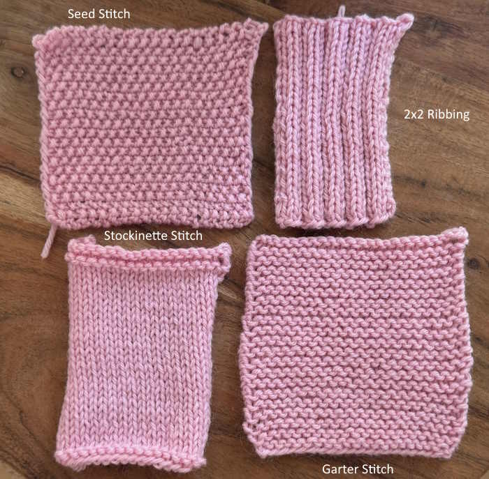 A swatch of the seed stitch, two by two ribbing, stockinette and knit garter stitch shown before blocking