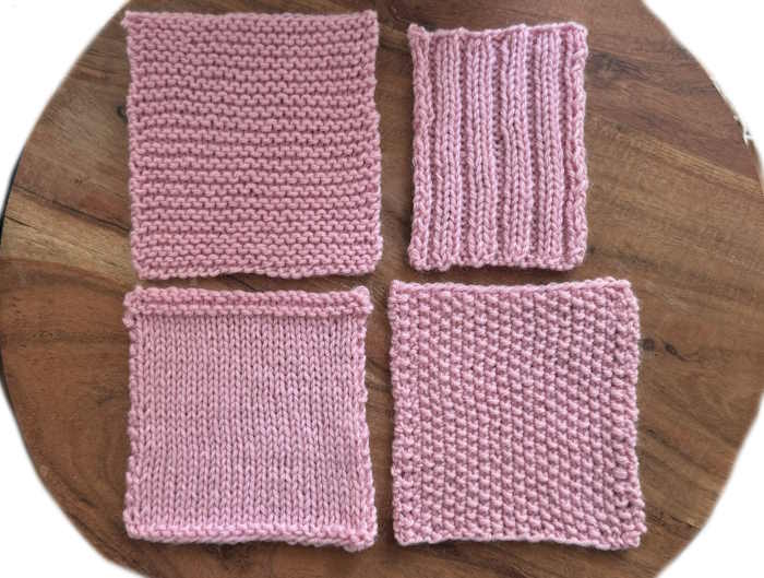 Four knit swatches worked in pink wool yarn, garter stitch, rib, seed and stockinette stitch patterns Four knit swatches worked in pink wool yarn, garter stitch, rib, seed and stockinette stitch patterns