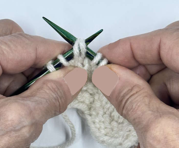 knitted decrease ssk, showing through the back loop knitted decrease ssk, showing through the back loop
