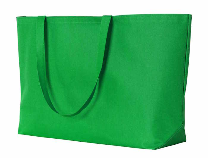 A green tote bag used as a project bag for knitting or crocheting