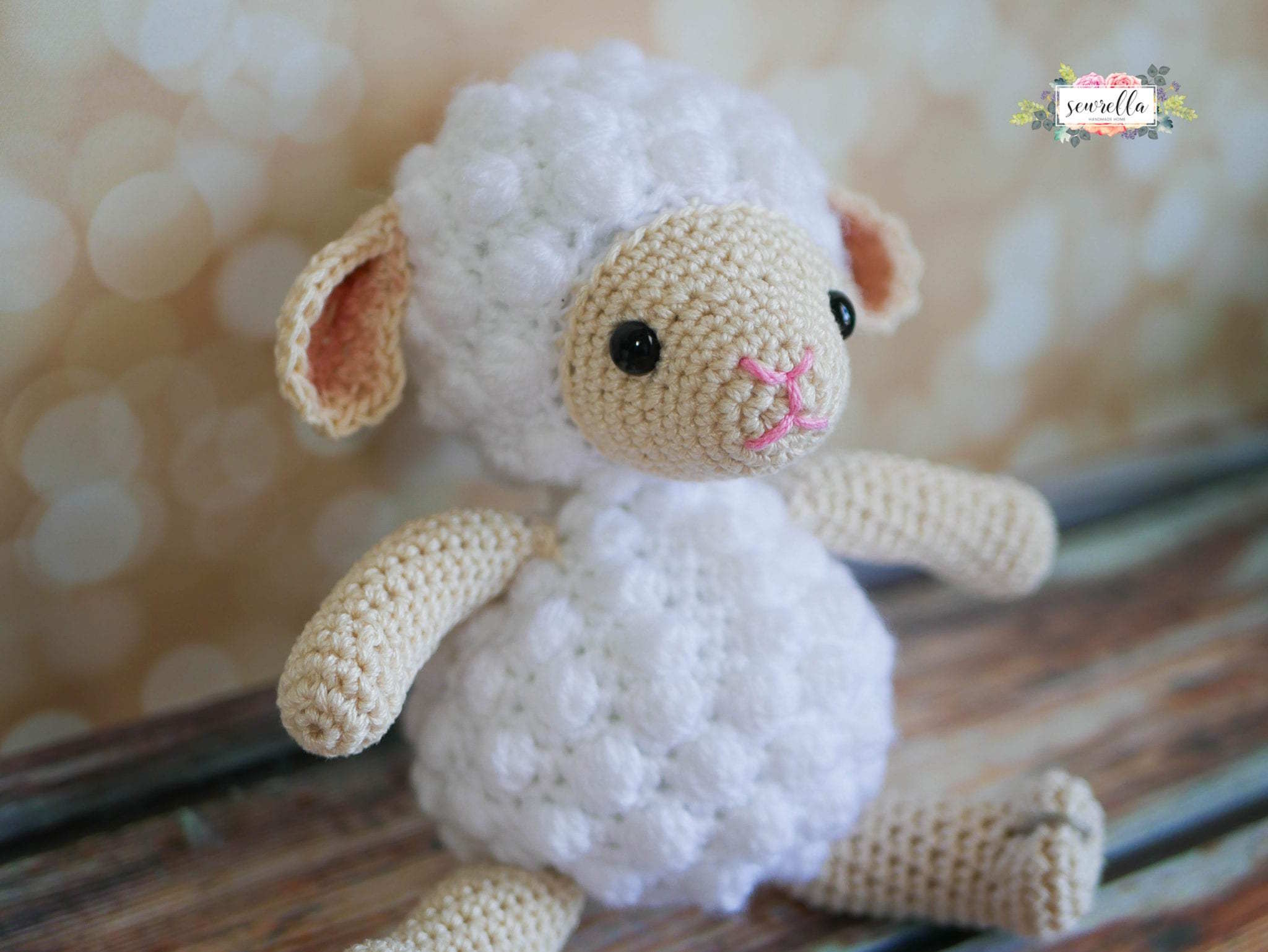 Lamb crochet toy worked in white yarn