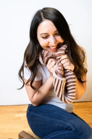 Laura Brioche knit cowl worn by a young woman