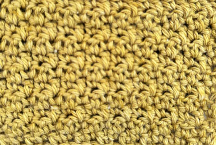 Closeup of the lemon peel crochet stitch also called griddle stitch. Closeup of the lemon peel crochet stitch also called griddle stitch.