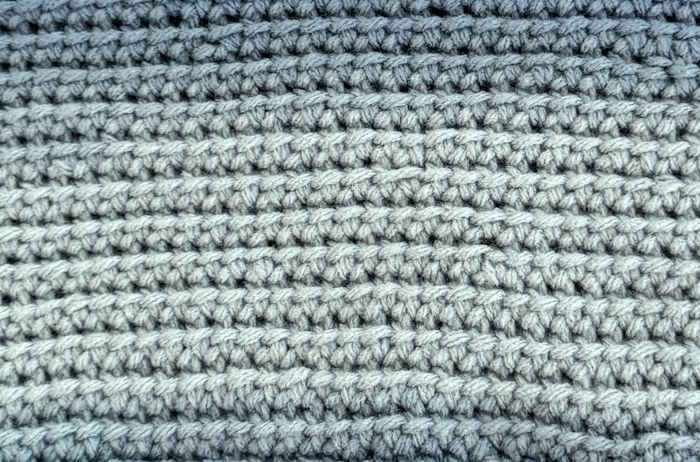 Linked half-double crochet swatch worked in ombre yarn. Linked half-double crochet swatch worked in ombre yarn.