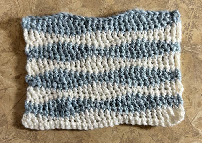 Long wave crochet stitch pattern worked in blue and white