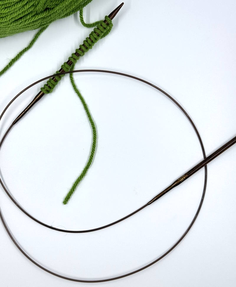 Circular needles with a long cable with stitches on the needle tips