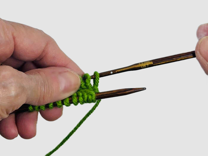 Magic Loop Knitting:  Pull out the back needle