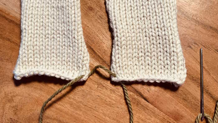 Beginning the mattress stitch with a figure 8.