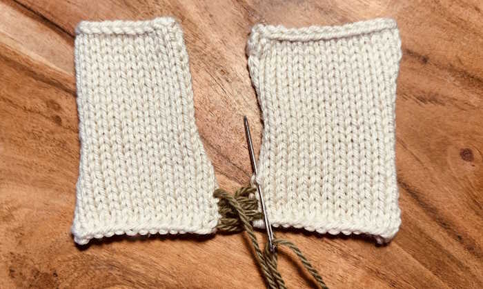 The mattress stitch has been worked about one inch without tightening