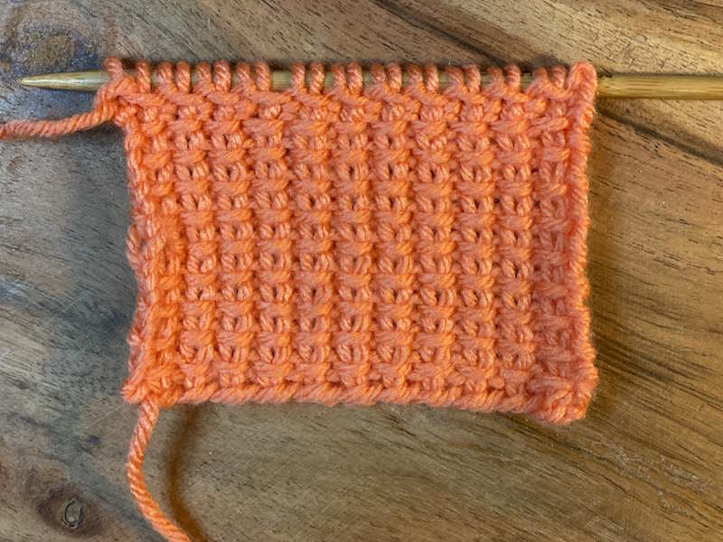 Mock ribbing slip stitch pattern showing wrong side of swatch