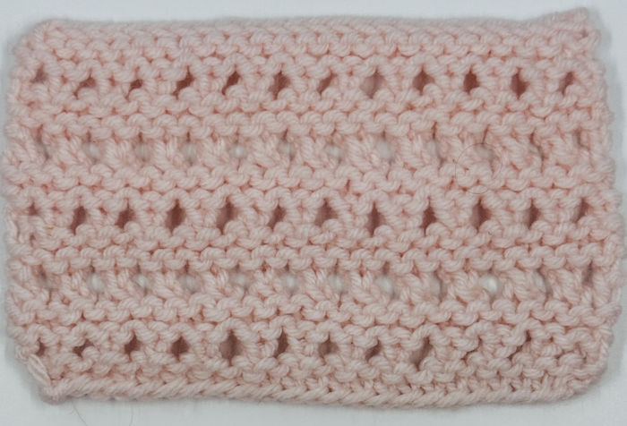 The right side showing of the open honeycomb stitch