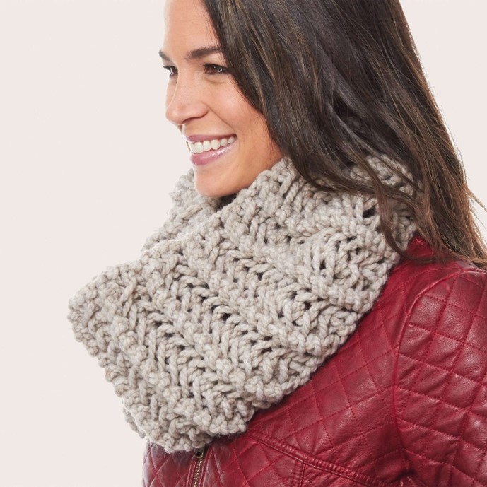 Bernat's open work cowl worn by a woman