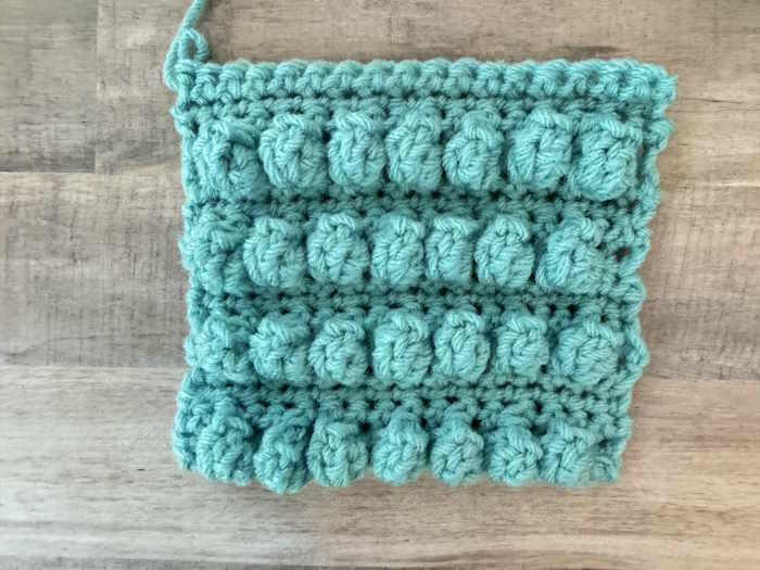 The right side showing of the crochet popcorn stitch swatch