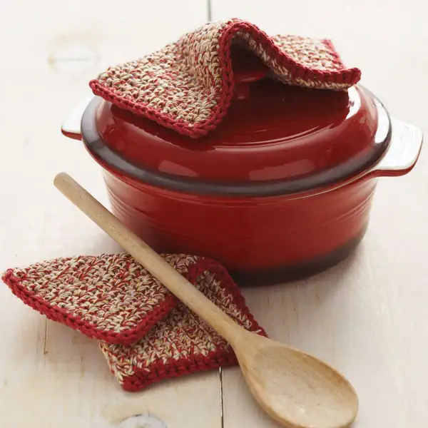 crochet potholder shown with pot and wooden spoon crochet potholder shown with pot and wooden spoon