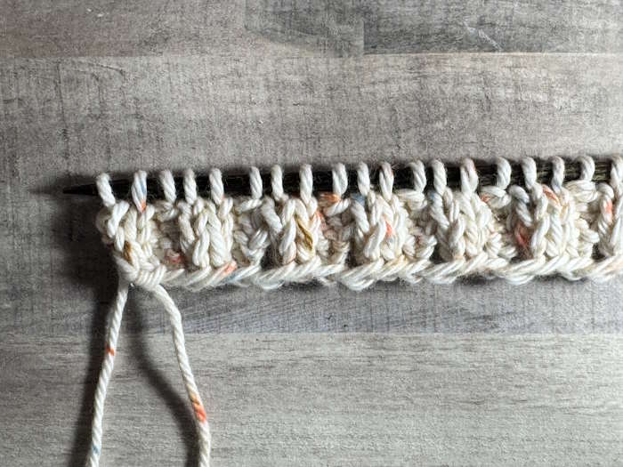 Step 5 of the puffed rib stitch pattern