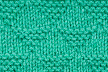 Thumbnail image of the knit pyramid stitch worked in teal