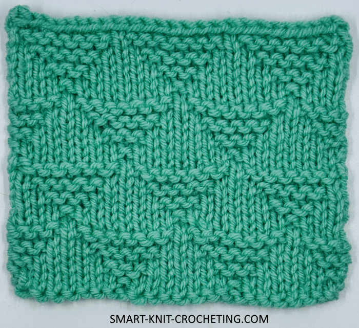 Knit Pyramid Pattern The right side is showing on a swatch knitted with the pyramid stitch pattern