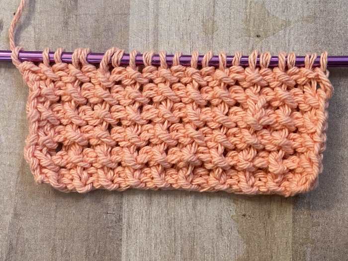 Front side showing of the knitted rice stitch Front side showing of the knitted rice stitch