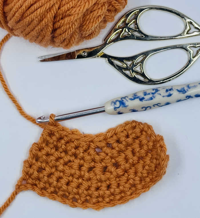 Swatch of single crochet decreases, making the decreases in the middle of the row.