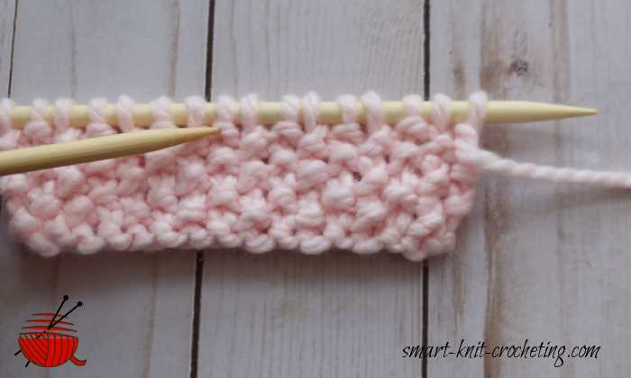 Purl stitches look like little bumps or seeds in this pattern.