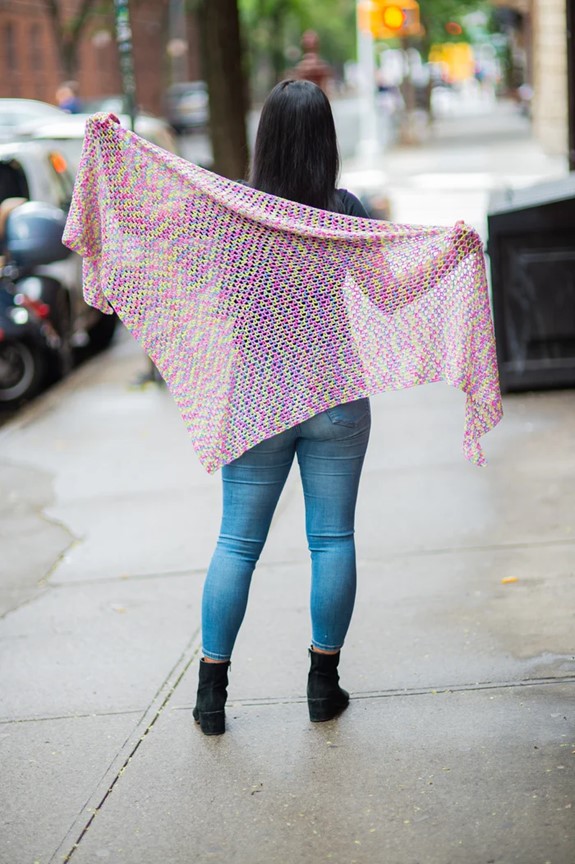 Free crochet pattern of a shawl using fingering weight yarn