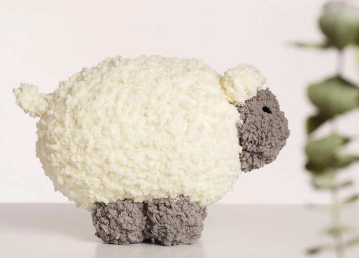 Toy sheep made with crochet in white yarn