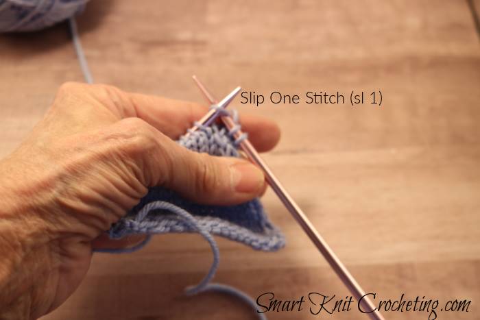 Slip One (SKP Knitting) Demonstration of the first step of SKP which is to slip one stitch.