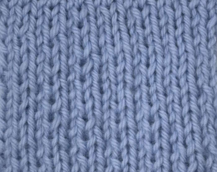Wrong side showing of the slip stitch rib knit pattern