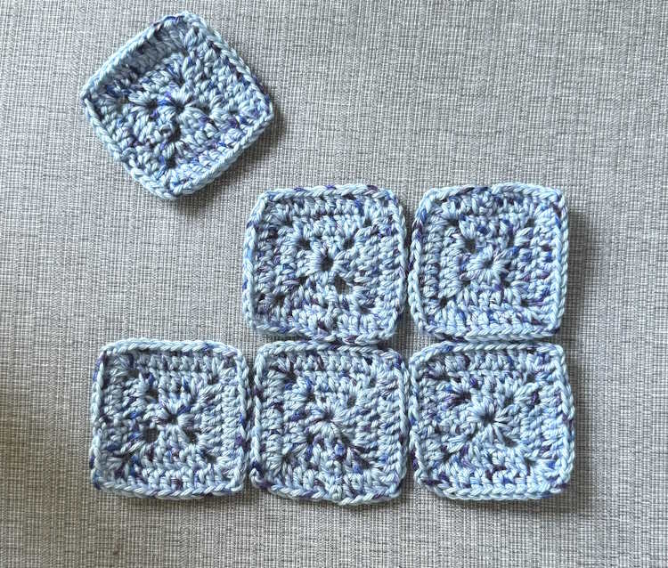 Arranging the solid granny squares to create a slipper