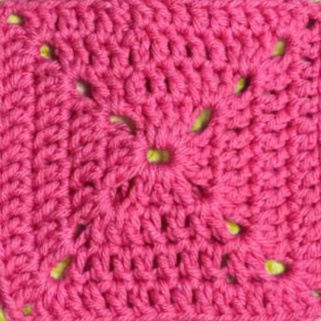 solid granny square thumbnail worked in pink yarn