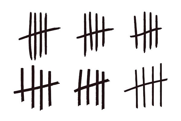 A series of tally mark on a white background A series of tally mark on a white background